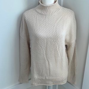 Knit loose pull over sweater.